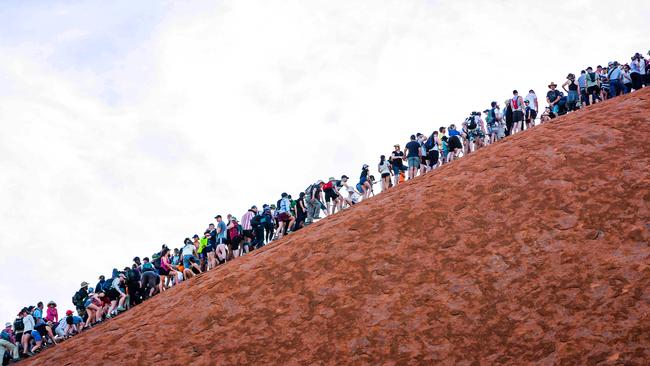 The long queue as the deadline for the ban on climbing Uluru looms is captured by this photograph, published by The Weekend Australian on October 5.