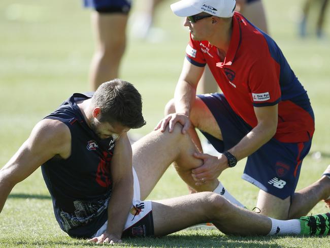 Jesse Hogan gets some treatment on his calf during training. Picture: Michael Klein