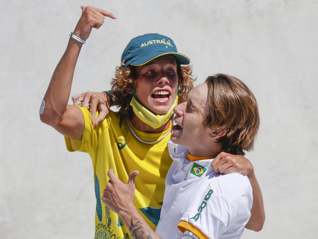 Keegan Palmer celebrates with Brazil’s Luiz Francisco.