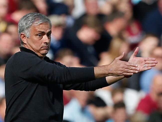 Manchester United's Portuguese manager Jose Mourinho gestures from the touchline during the English Premier League football match between West Ham United and Manchester United at The London Stadium, in east London on September 29, 2018. (Photo by Ian KINGTON / AFP) / RESTRICTED TO EDITORIAL USE. No use with unauthorized audio, video, data, fixture lists, club/league logos or 'live' services. Online in-match use limited to 120 images. An additional 40 images may be used in extra time. No video emulation. Social media in-match use limited to 120 images. An additional 40 images may be used in extra time. No use in betting publications, games or single club/league/player publications. /