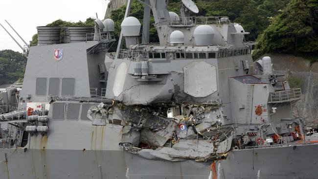 Stories of survival from the USS Fitzgerald paint a harrowing account of the moments after it collided with the container ship ACX Crystal off Japan. Picture: AP