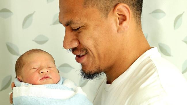 Tigers NRL player with newborn baby