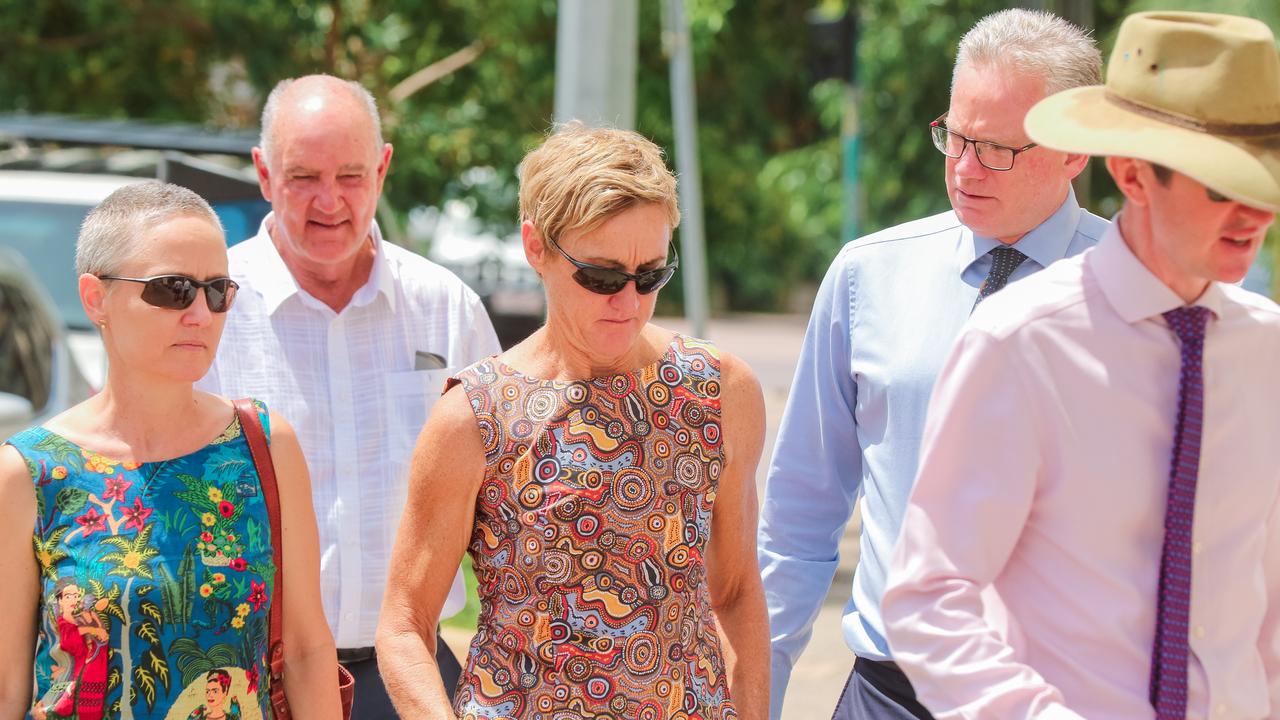 Former Children's Commissioner Colleen Gwynne , flanked by her legal team going into Darwin Magistrates Court. Picture: Glenn Campbell