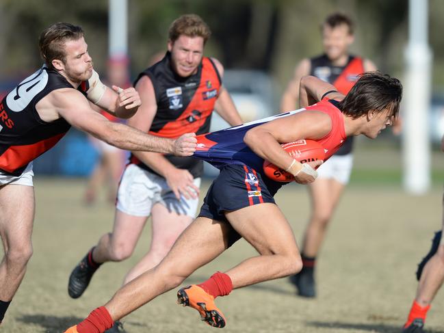 Tom Freeman, pictured with the ball playing for Mt Eliza last season, has made Rowville his home club in 2019. Picture: Chris Eastman