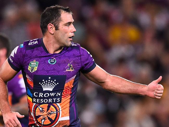 Cameron Smith gives a thumbs up after kicking the winning field goal against Cowboys.