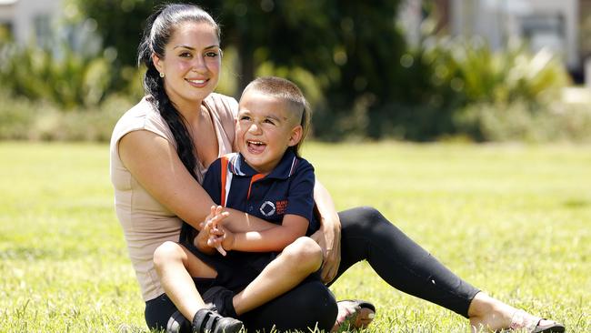 Tiffany Dionysiou tested her son Benjamin El-Ashrafi before his first day of kindergarten on Tuesday despite disagreeing with the policy. Picture: Tim Hunter