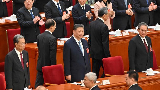 President Xi Jinping arrives for the second plenary session of the National People's Congress.