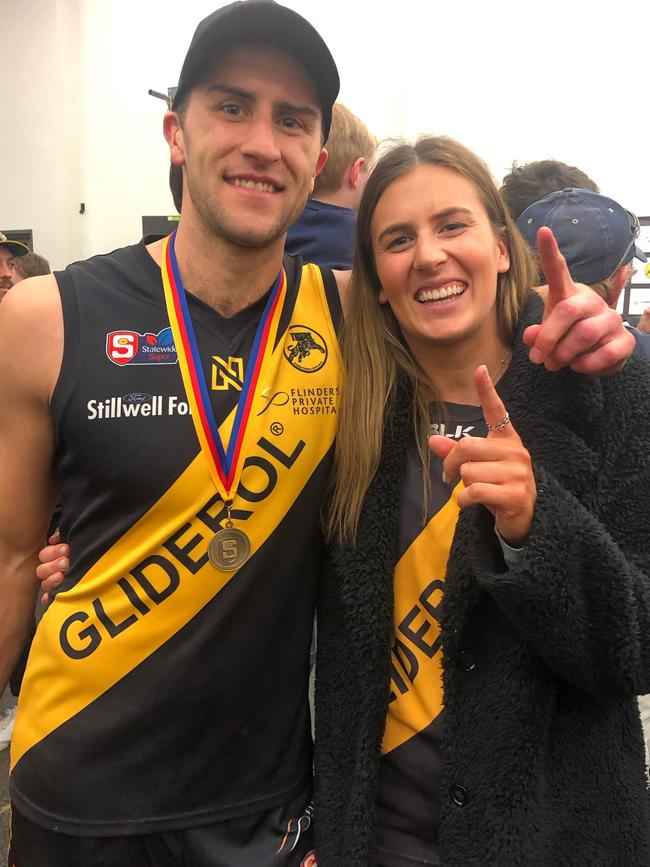 Glenelg defender Max Proud with his sister Maddy after the Tigers’ drought-breaking flag win in 2019.