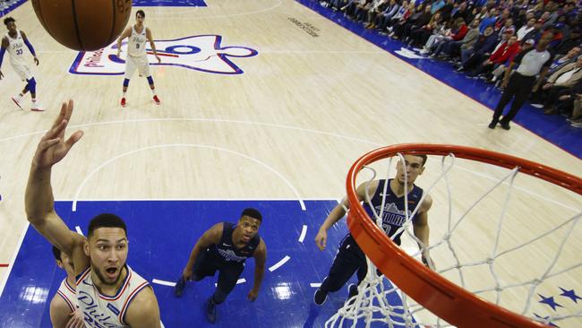 Ben Simmons shoots against the Dallas Mavericks. Picture: AP.