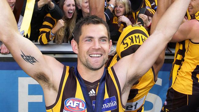 2013 AFL Grand Final at the MCG, Melbourne , Australia - September 28th, Hawthorn V Fremantle. Hawthorn's Luke Hodge celebrates with the Premiership cup . Picture by George Salpigtidis