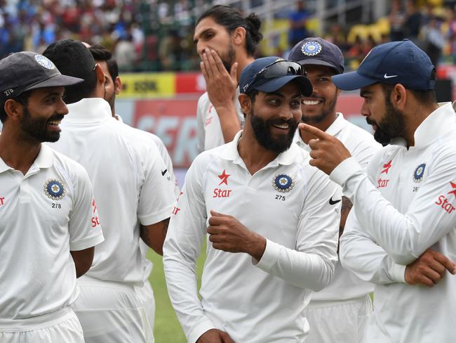 IVirat Kohli donned the whites as soon as victory had been sealed.
