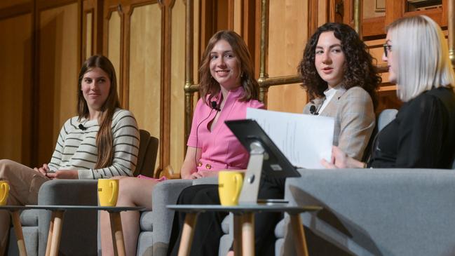 Flinders University’s Sarah Walsh questions students Chloe McPherson, Lucy Scinto and Melina Gaffey (from left) during the Fearless Conversations from our Next Generation panel discussion at the Adelaide Town Hall. Picture: Brenton Edwards