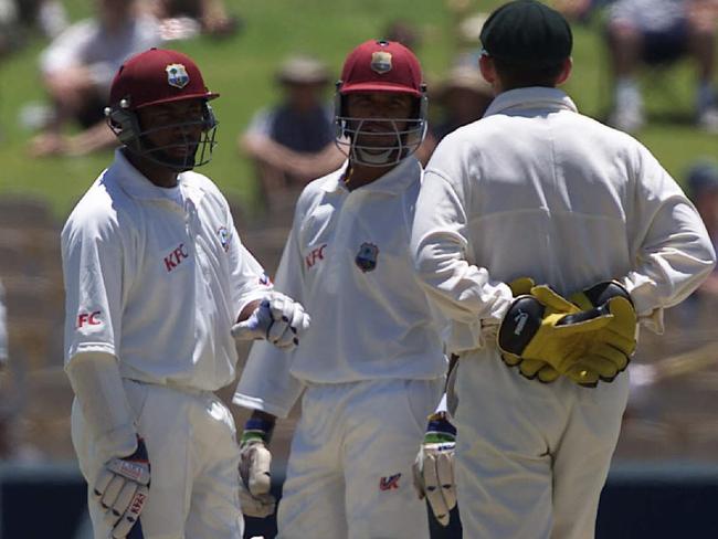 Brian Lara (L) and Darren Ganga (R) trade barbs with Adam Gilchrist. Picture: Brett Costello