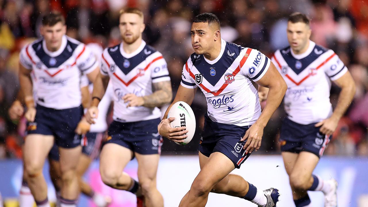 Siosiua Taukeiaho makes a charge for the Roosters. Photo by Mark Kolbe/Getty Images