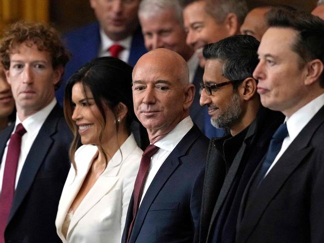 TOPSHOT - (L-R) CEO of Meta Mark Zuckerberg, Lauren Sanchez, US businessman Jeff Bezos, CEO of Alphabet Inc and Google Sundar Pichai and Teska and SpaceX CEO Elon Musk attend the inauguration ceremony where Donald Trump will sworn in as the 47th US President in the US Capitol Rotunda in Washington, DC, on January 20, 2025. (Photo by Julia Demaree Nikhinson / POOL / AFP)