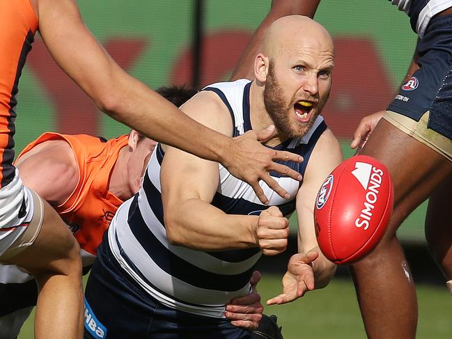 AFL Round 4. 13/04/2019. Geelong v GWS Giants at GMHBA Stadium .  Geelongs Gary Ablett  clears by hand    . Pic: Michael Klein.