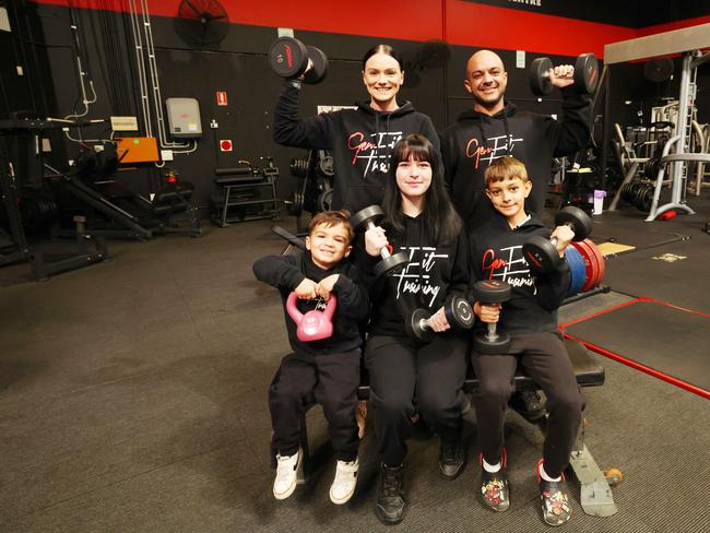 Genfit Ormeau have won the best gym on the Gold Coast competition for the sixth year in a row. Owners Michael and Jessica Kassouh with thier kids  Roman 5, Laila-Jade 16, and Jay 13 in the gym. Picture Glenn Hampson