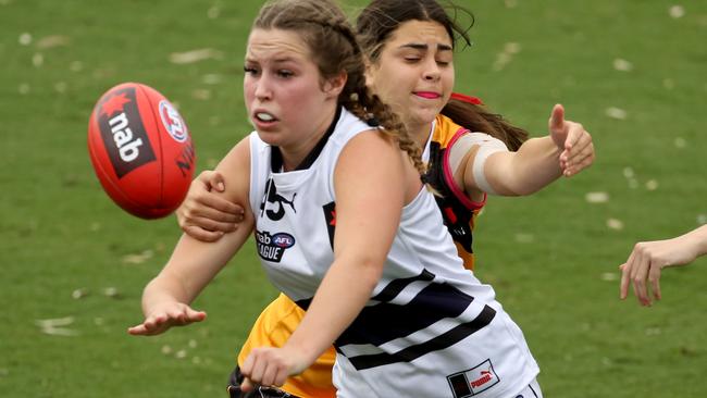 Molly McErlain fires off a handball for the Northern Knights. Picture: Stuart Milligan