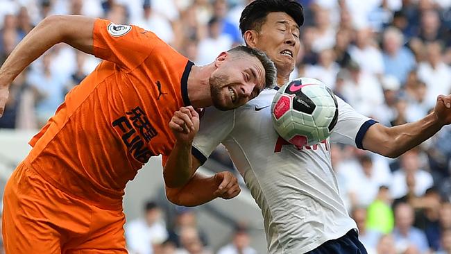 Newcastle United's Welsh defender Paul Dummett (L) vies with Tottenham Hotspur's South Korean striker Son Heung-Min. Picture: Daniel Leal-Olivas/AFP) /