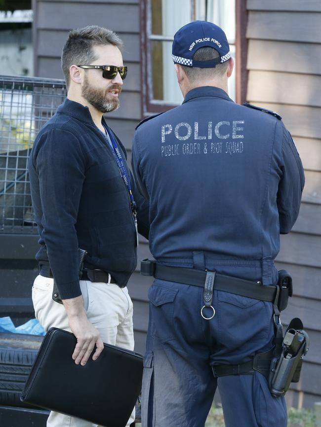 Police and forensics at the scene on Monday. Picture: David Swift