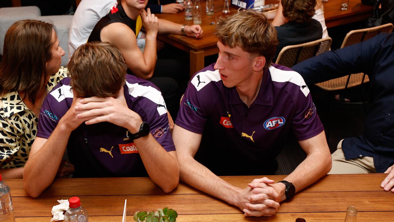 Jubilation for one, heartbreak for the other. (Photo by Michael Willson/AFL Photos via Getty Images)