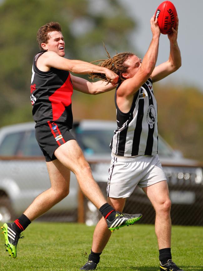 Crib Point's Luke Herrington marks in front of Frankston Bomber Jacob Cudmore. Picture: David Trend