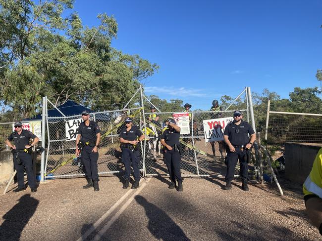 Around 20 Save Lee Point protesters clashed with construction workers and police as bulldozers moved in to the controversial Defence Housing Australia development site on Tuesday morning. Picture: Zizi Averill