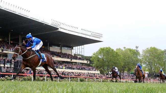 It just doesn’t happen: Winx extends her lead with every stride as she pulverises her rivals in this year’s Cox Plate. Picture: George Salpigtidis