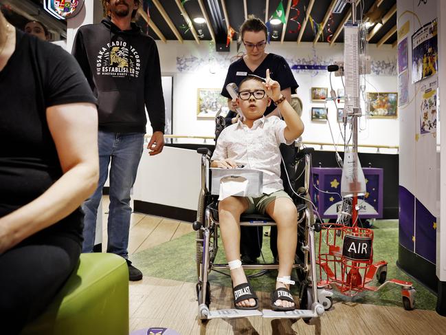 One week after surgery Issac enjoyed a game of bingo. Picture: Sam Ruttyn