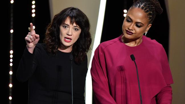 Italian actor Asia Argento, left, speaks at the Cannes Film Festival. Picture: AFP/Alberto Pizzoli