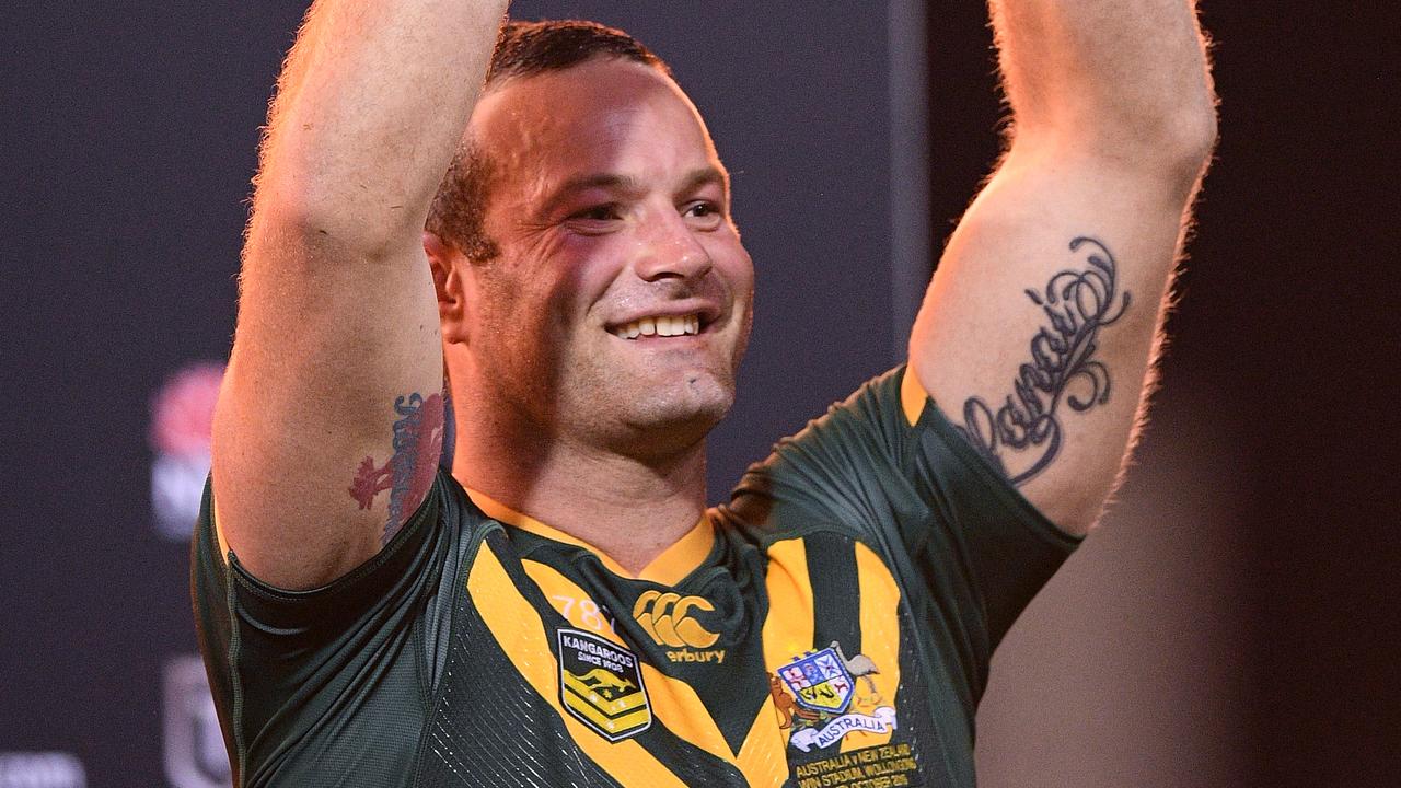 Kangaroos skipper Boyd Cordner lifts the trophy after his team's win in the Oceania Cup Test Match between Australia and New Zealand