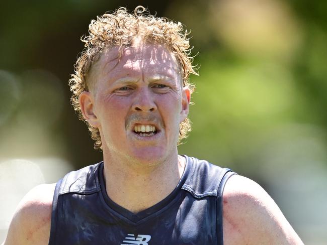 MELBOURNE, AUSTRALIA - NOVEMBER 22: Clayton Oliver of the Demons runs laps during a Melbourne Demons AFL training session at Gosch's Paddock on November 22, 2024 in Melbourne, Australia.  (Photo by Quinn Rooney/Getty Images)