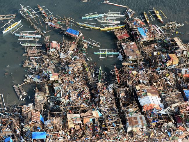 Vital...UN Secretary-General Ban Ki-moon said leaders must act now to combat climate change. This photo shows destroyed houses in the town of Guiuan in Eastern Samar province in the central Philippines, after Super Typhoon Haiyan. Picture: AFP/Ted Aljibe