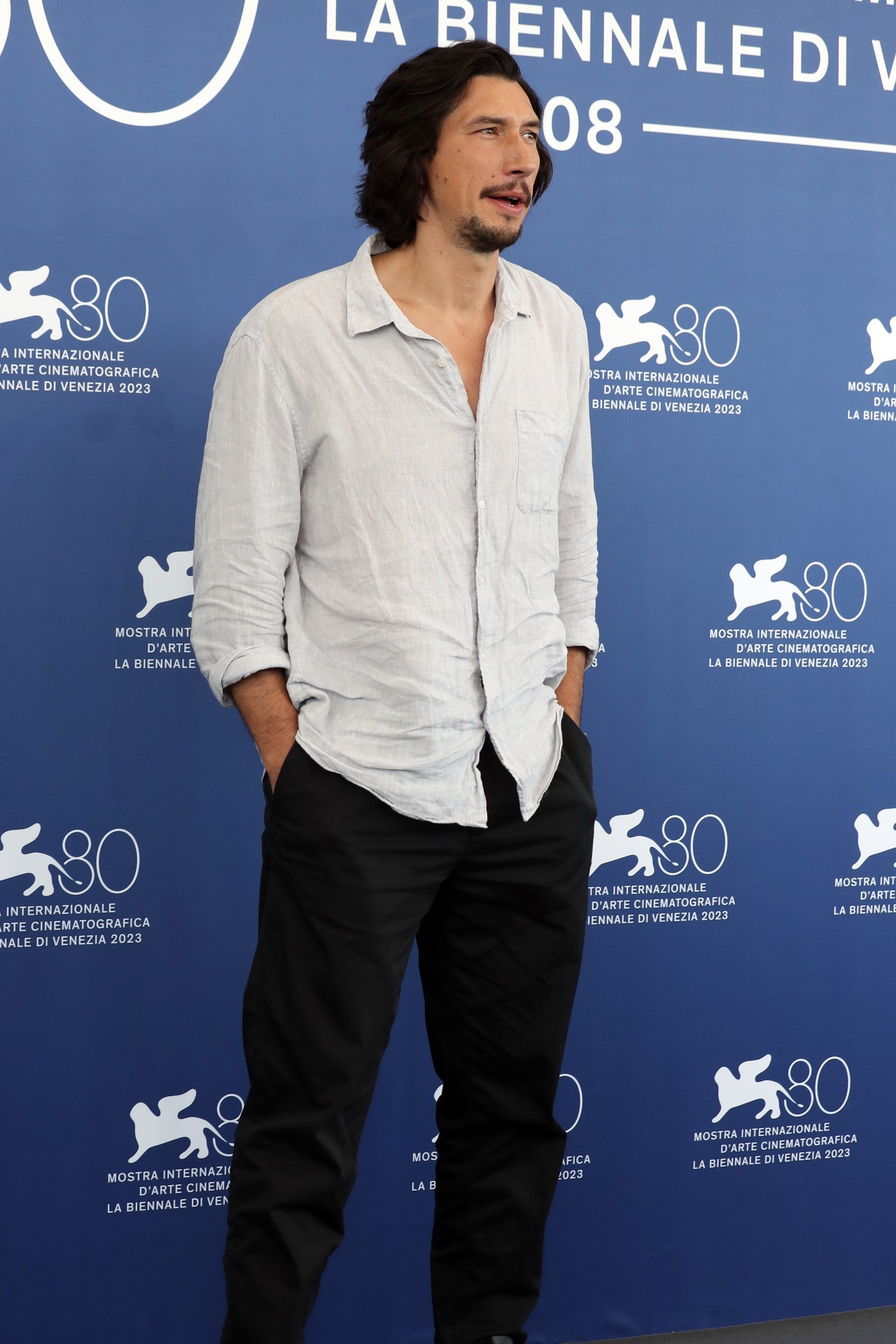 <p>Adam Driver exalted the timeless appeal of a perfectly worn-in linen shirt in his take on smart casual. Rolling through to the Ferrari photo call in a pair of black trousers and sneakers, with a cloud-grey linen shirt. Buttoned-down to the sternum, Driver&rsquo;s simple but effective fit is a reminder that at the end of the day, it&rsquo;s never worth overthinking it.</p>