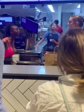 The 19-year-old woman yells at staff.