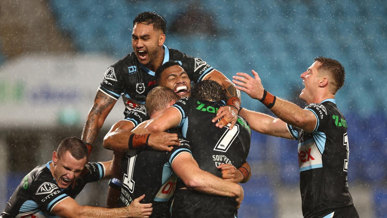 GOLD COAST, AUSTRALIA - MAY 22: Lachlan Miller of the Sharks celebrates a try during the round 11 NRL match between the Gold Coast Titans and the Cronulla Sharks at Cbus Super Stadium, on May 22, 2022, in Gold Coast, Australia. (Photo by Chris Hyde/Getty Images)