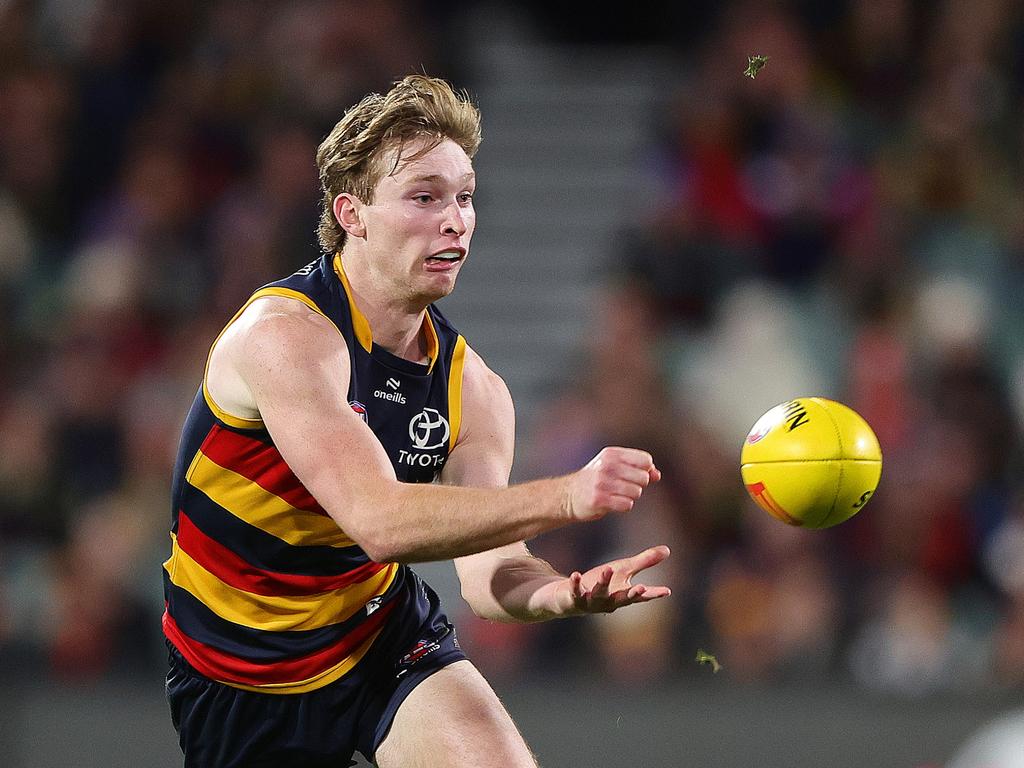 Michalanney dishes off a handball. Picture: Getty Images