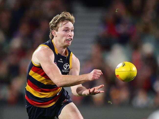 Michalanney dishes off a handball. Picture: Getty Images