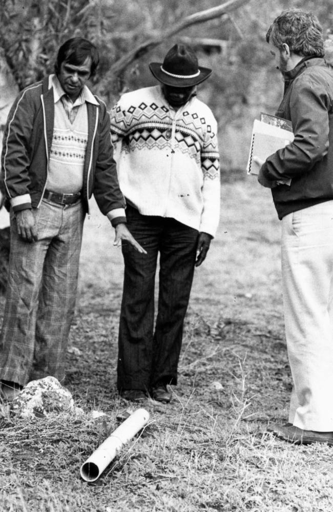 Tracker Jimmy James with nephew Bluey at a murder site at Monteith in 1985.