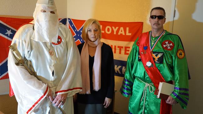 60 Minutes’ Liz Hayes flanked by members of the Royal White Knights, including Orange County Ku Klux Klan Grand Dragon Will Quigg (right). Picture: Channel 9