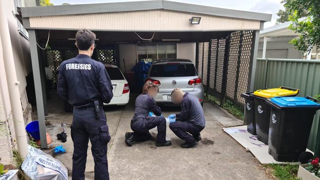 Australian Federal Police at the house in Forestville after the arrest of Mark De Hesselle. Picture: AFP