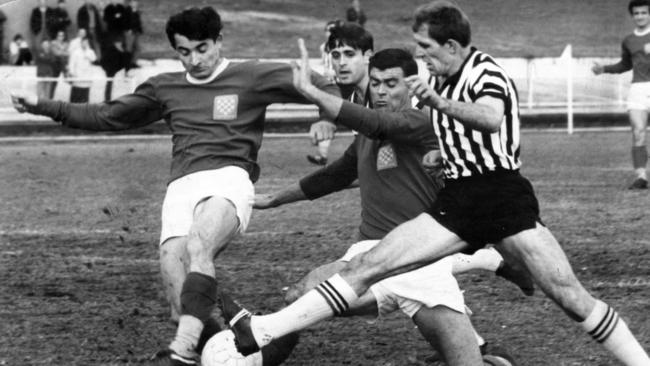 Soccer - Juventus vs Croatia match at Olympic Sports Field. "Steve Herczeg, Juventus (right), is challenged by Croatia defenders Frank Balter (left) and Peter Basic in the game ... which ended in a 2-1 win for Croatia". Used "Sunday Mail" 22 Jun 1968. (Pic by unidentified staff photographer)