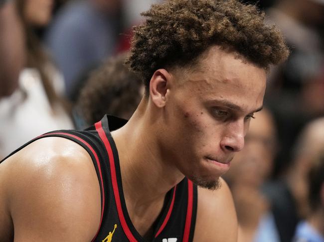 Atlanta Hawks guard Dyson Daniels (5) reacts to a loss on the bench in overtime of an NBA play-in tournament basketball game against the Miami Heat, Friday, April 18, 2025, in Atlanta. (AP Photo/Brynn Anderson)