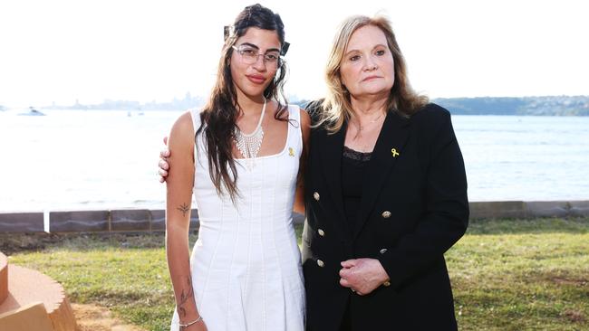 Nova Music Festival massacre survivor Michal Ohana, left, and Sydney resident Melissa McCurdie, whose extended family members were taken hostage, at the memorial event. Picture: John Feder