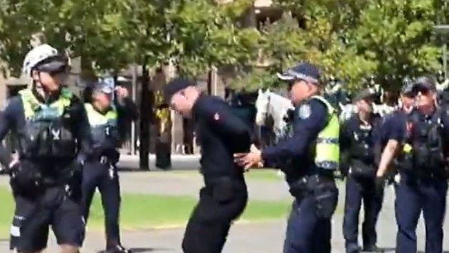 Thomas Sewell is arrested at the Adelaide War Memorial on Australia Day 2025. Picture: 7NEWS