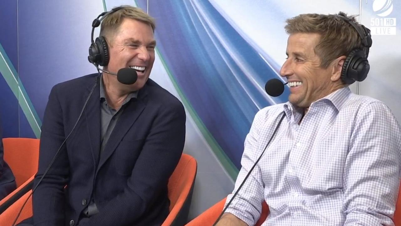 Shane Warne and Mark Howard react to the dig.