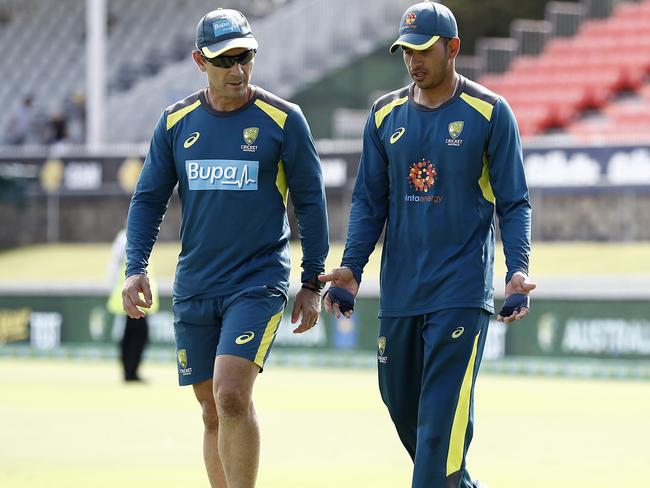 Justin Langer, coach of Australia, speaks to Usman Khawaja of Australia during day four of the Second Test match between Australia and Sri Lanka at Manuka Oval on February 04, 2019 in Canberra, Australia. (Photo by Ryan Pierse/Getty Images)