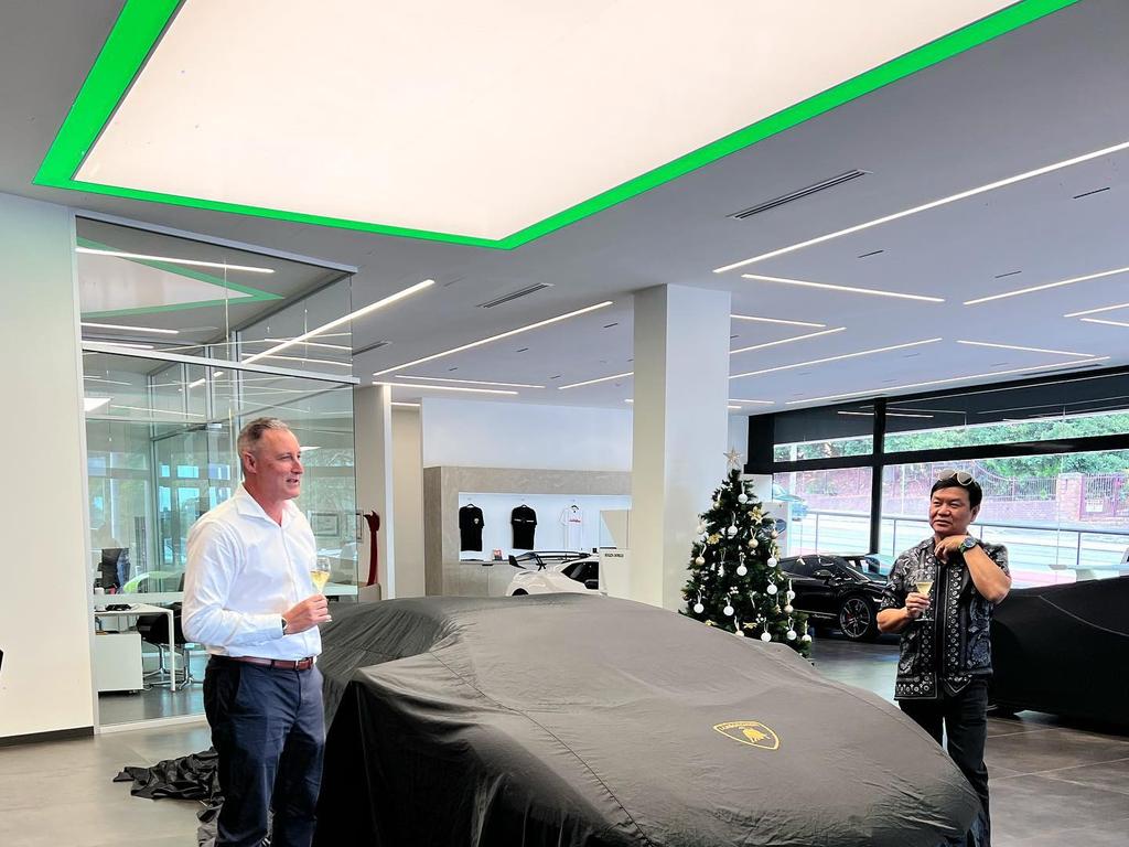 Ben Huynh (R) with a covered Lamborghini. Picture: Instagram