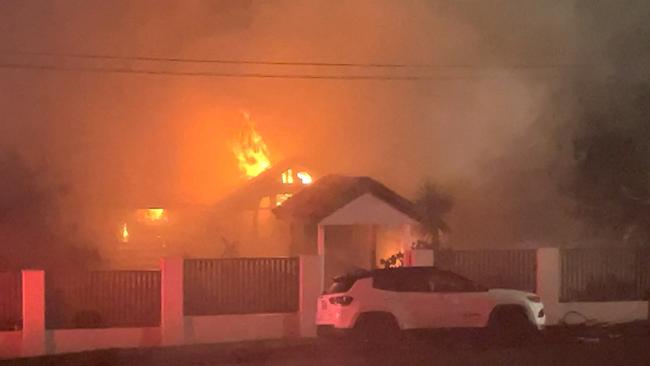 The home on fire on Sirius St, Coorparoo.