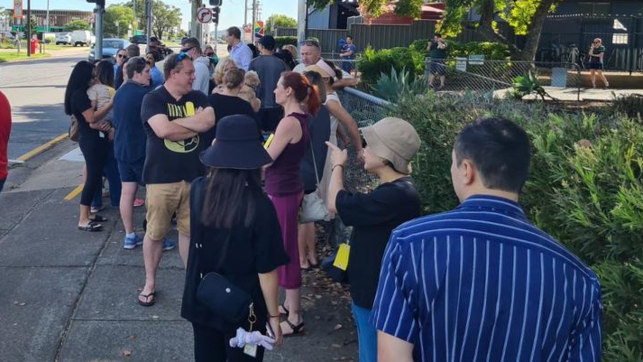 Parents protest outside Rochedale State School following the asbestos scandal.